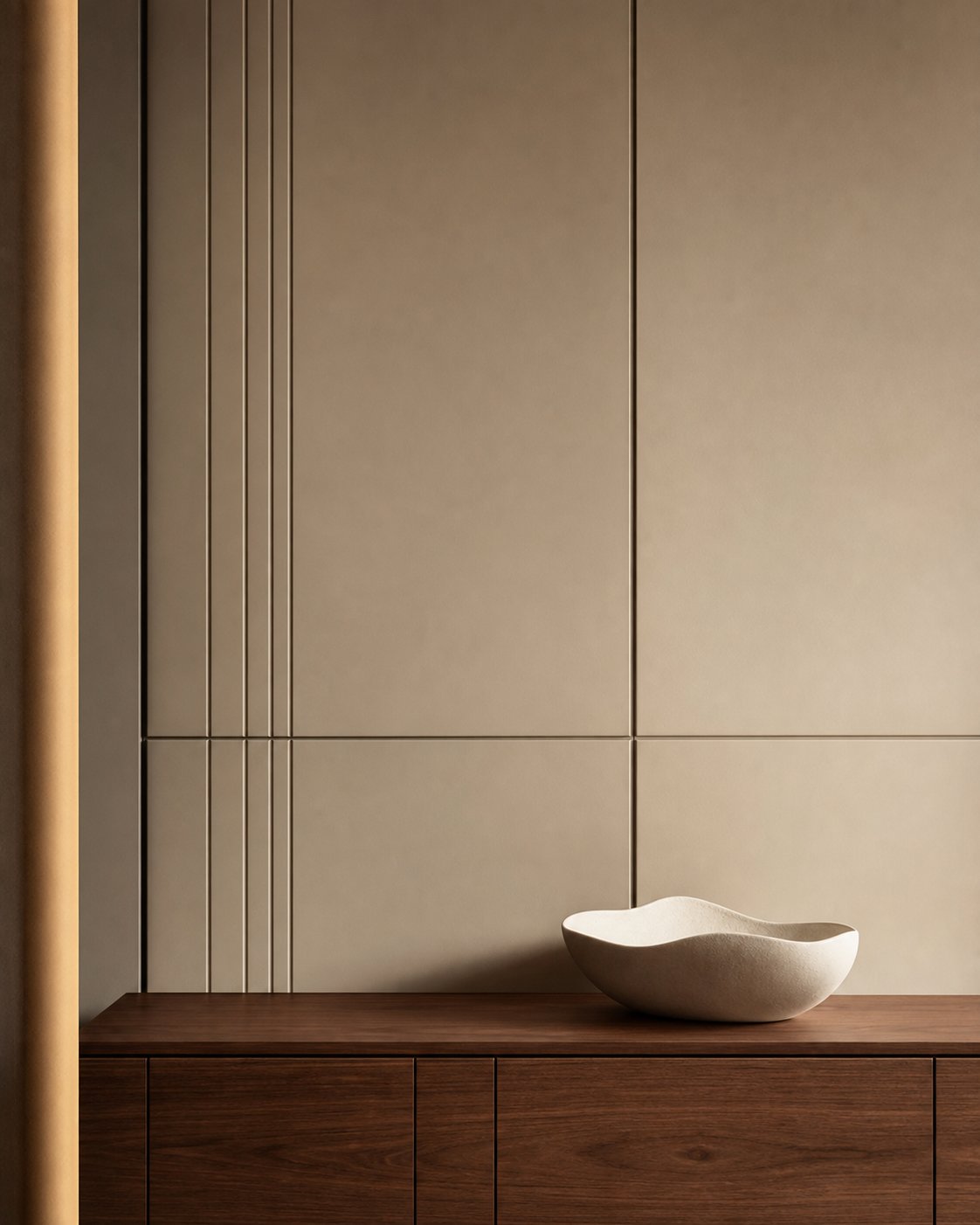 Warm taupe decorative wall panels with precise geometric lines above a walnut sideboard